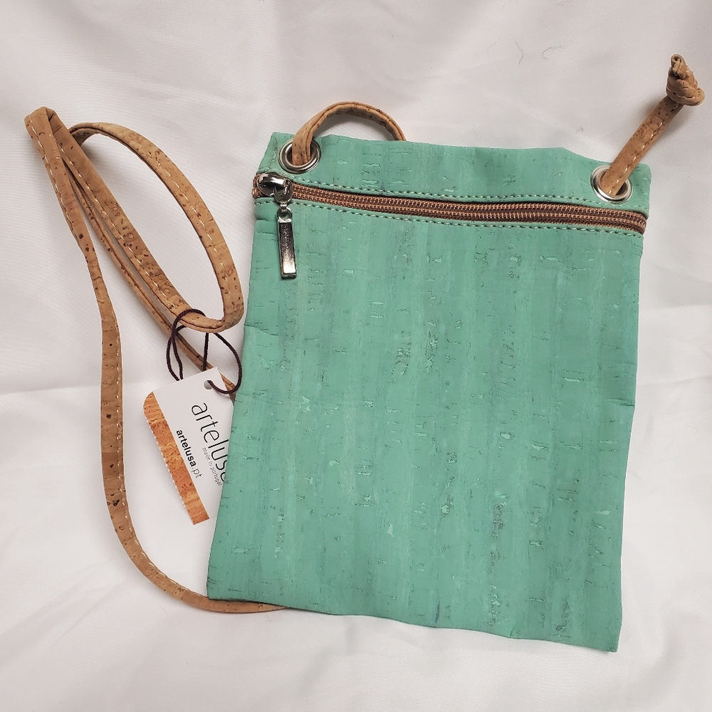 Artelusa cork crossbody bag Watergreen in color